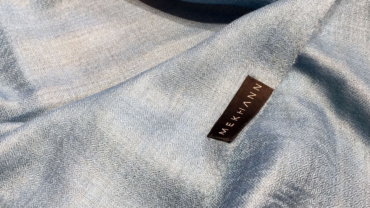 Mekhann logo tag on fabric
